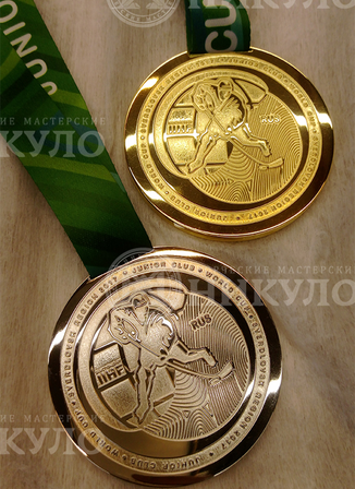 Наградные медали молодежного Чемпионата мира по хоккею